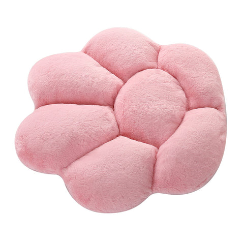 Ditucu Cat Paw Cushion in a reading corner enhances cozy ambiance.