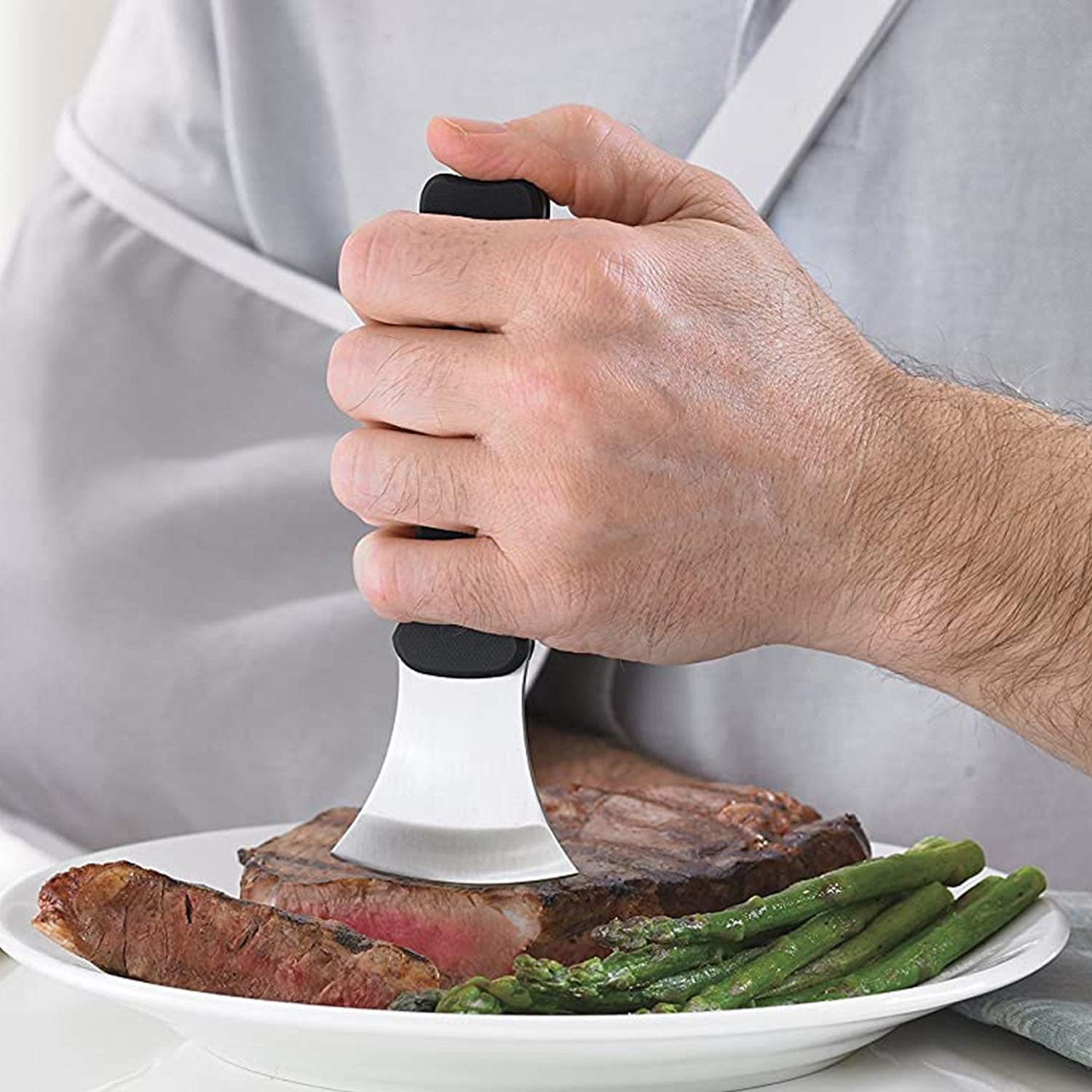 DMI rocker knife with ergonomic handle enables precise one-handed cutting.