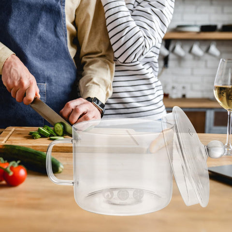 DOITOOL glass pot moves safely from stove to table with sturdy handle.