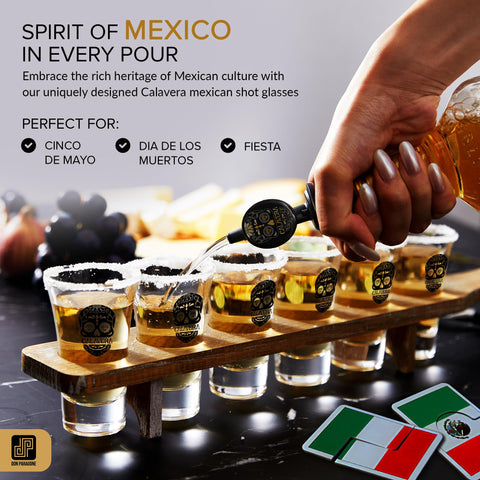 Don Paragone Calavera shot glasses arranged on the oak board for a fiesta
