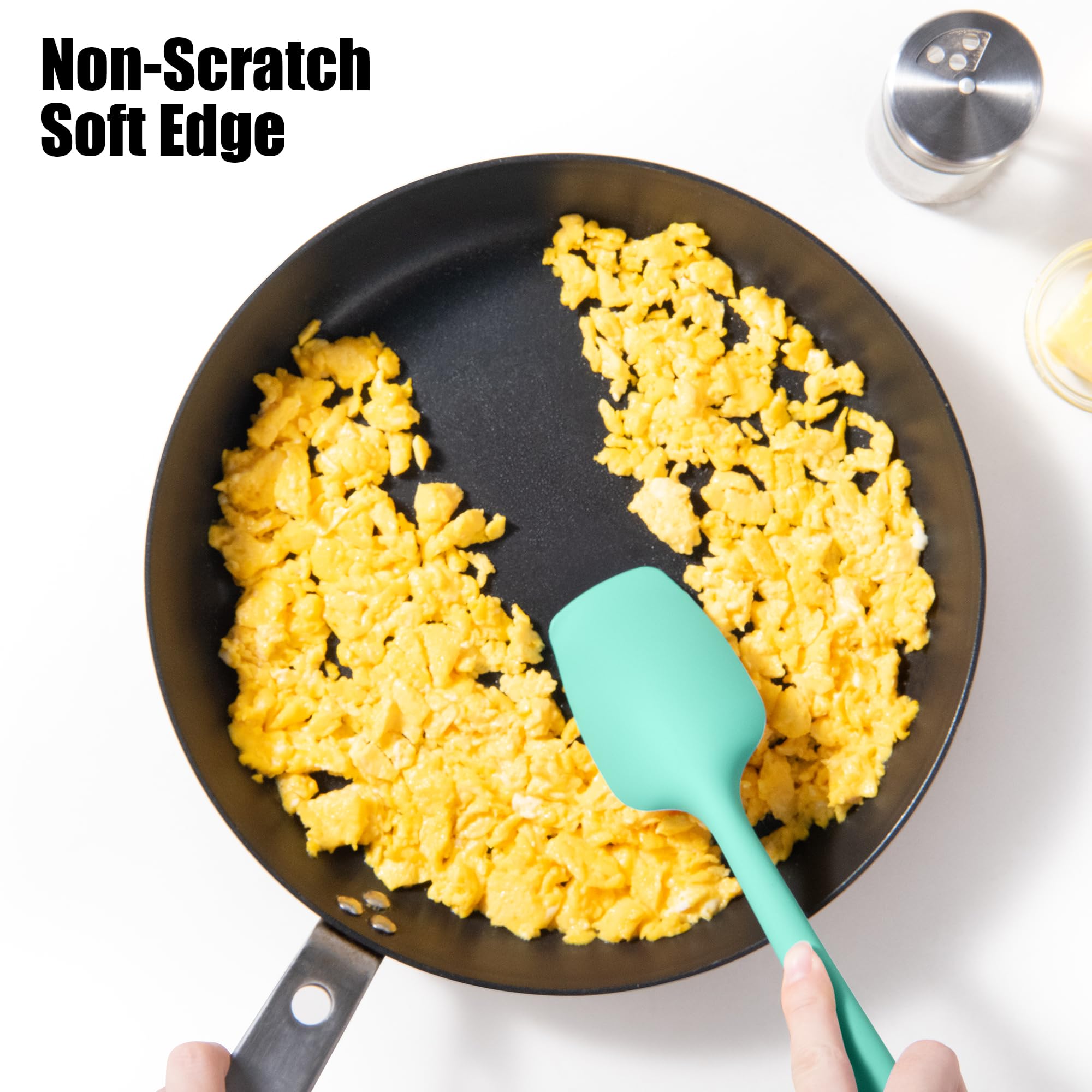 Doosu silicone spatula protects non-stick pans from scratches during flipping.