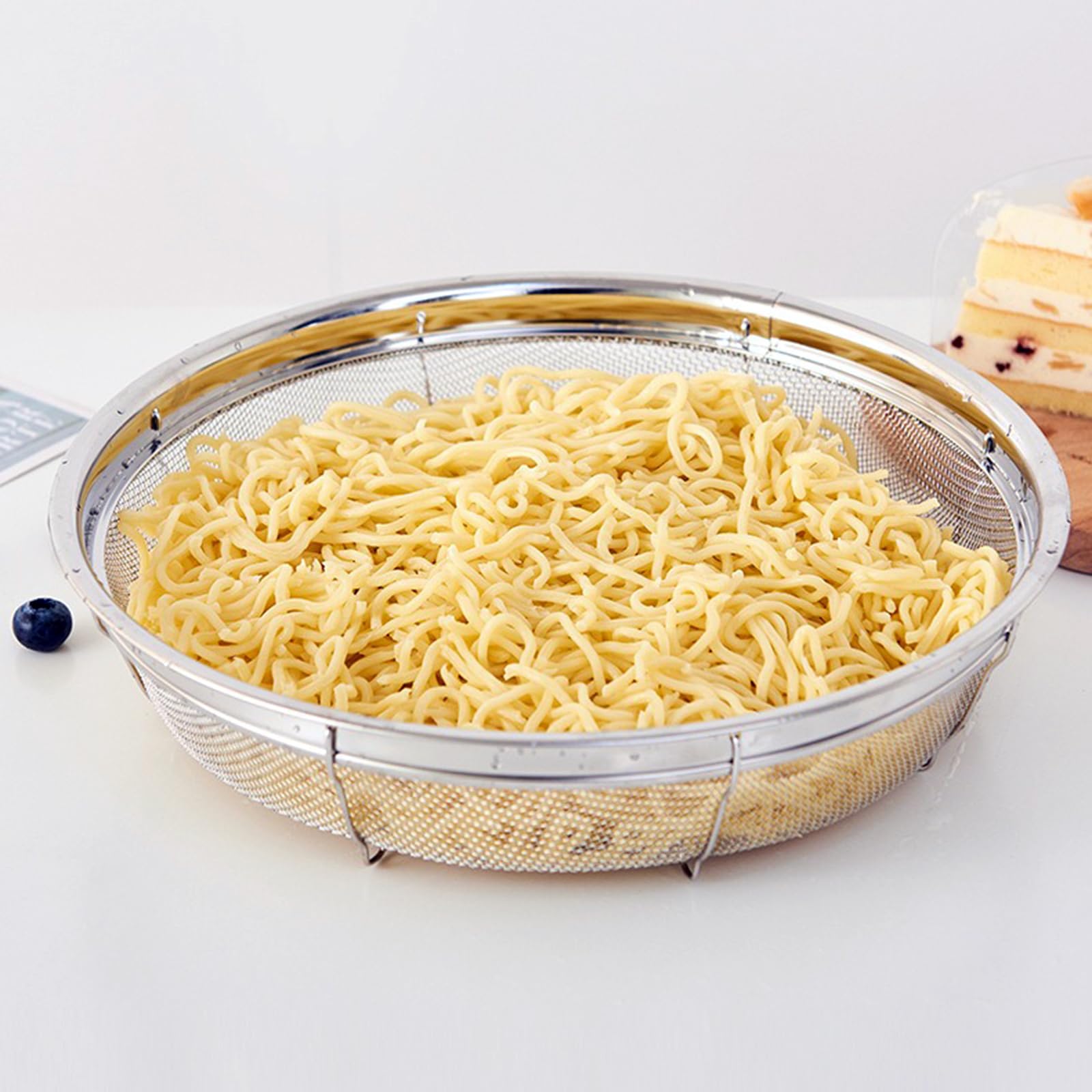 DOPMEP multi-purpose strainer for sieving rice, fruits, and veggies.