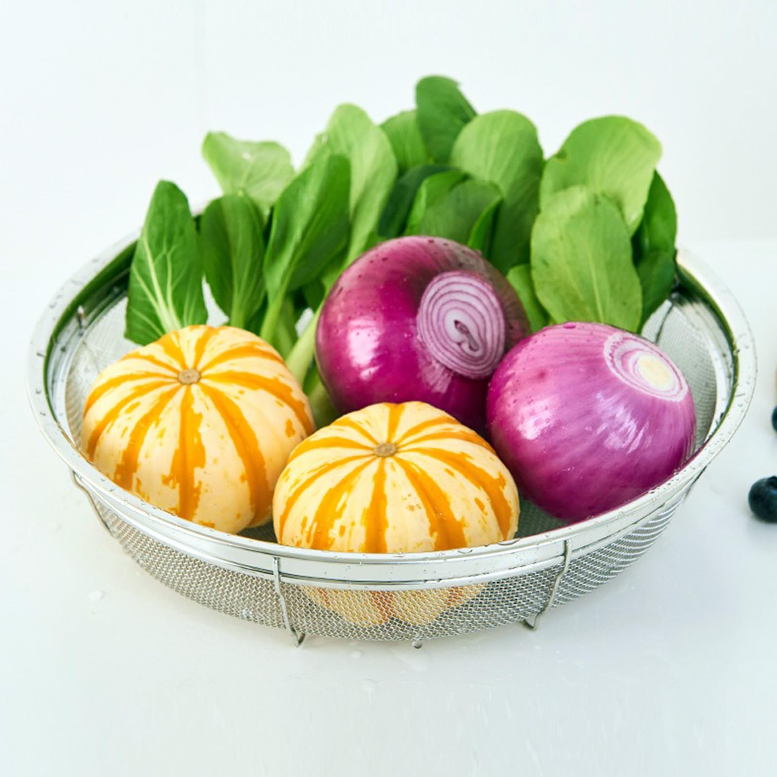 DOPMEP stackable colander baskets save space in compact kitchens.