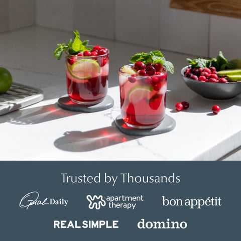 Dorai stone coasters' modern design complements coffee tables.