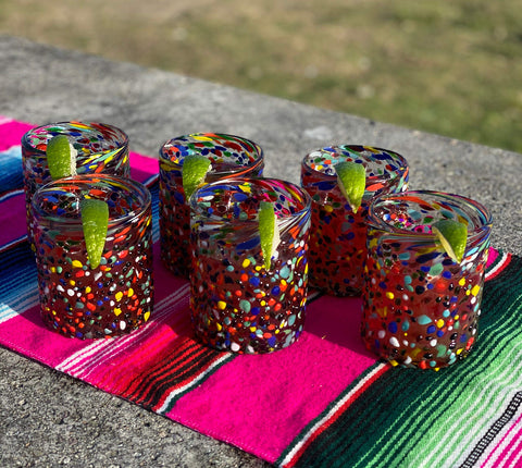 Close-up of confetti rock detail on a Dos Sueños 10 oz tumbler for celebrations.