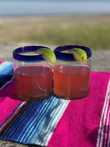 Dos Sueños dishwasher-safe glassware in a graceful stack.