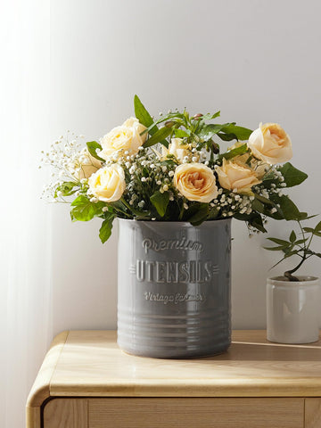 DOWAN ceramic crock with stable base reduces tipping on busy countertops.