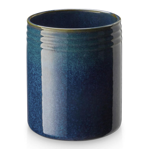DOWAN ceramic utensil holder on countertop with cork bottom for stability.