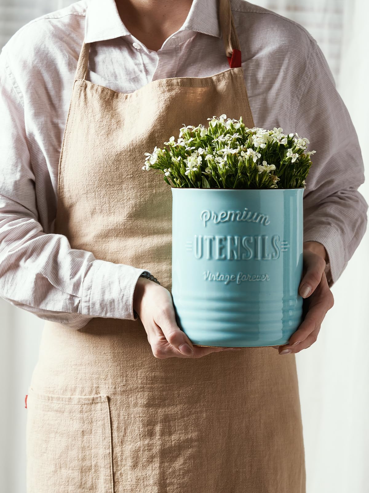 Turquoise DOWAN utensil holder adds stylish countertop decor and organization.