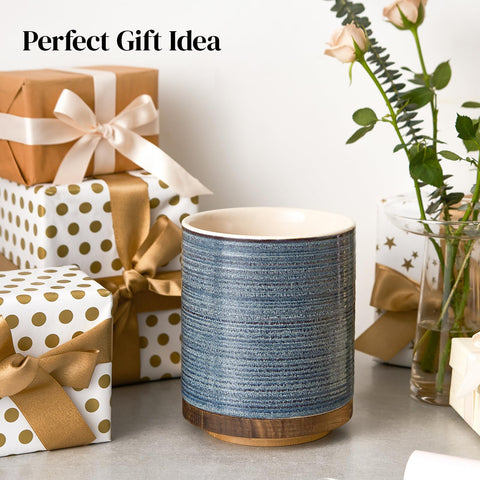 DOWAN farmhouse-decor ceramic holder adds style while organizing kitchen tools.