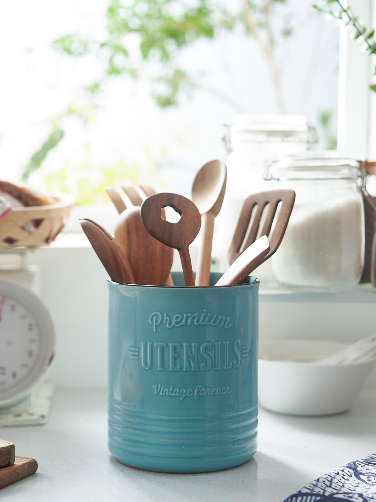 DOWAN farmhouse-style turquoise decor adds rustic warmth to kitchens.