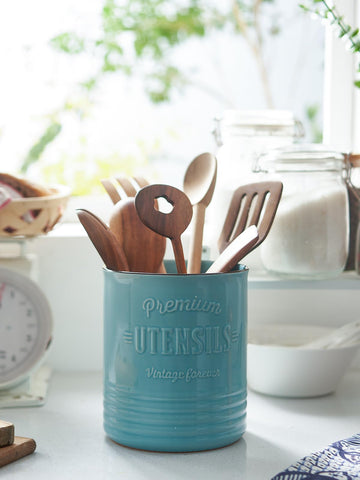 DOWAN farmhouse-style turquoise decor adds rustic warmth to kitchens.