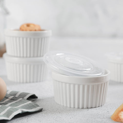 DOWAN lunch-ready ramekins with lids for portable meals.
