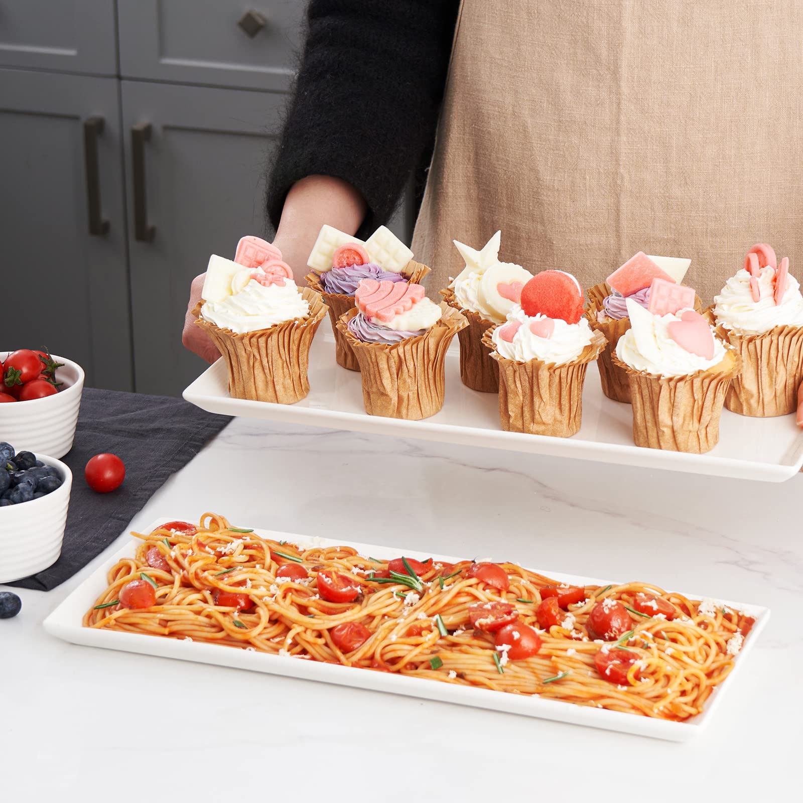 Dowan porcelain serving platters showcase appetizers and meals with style.