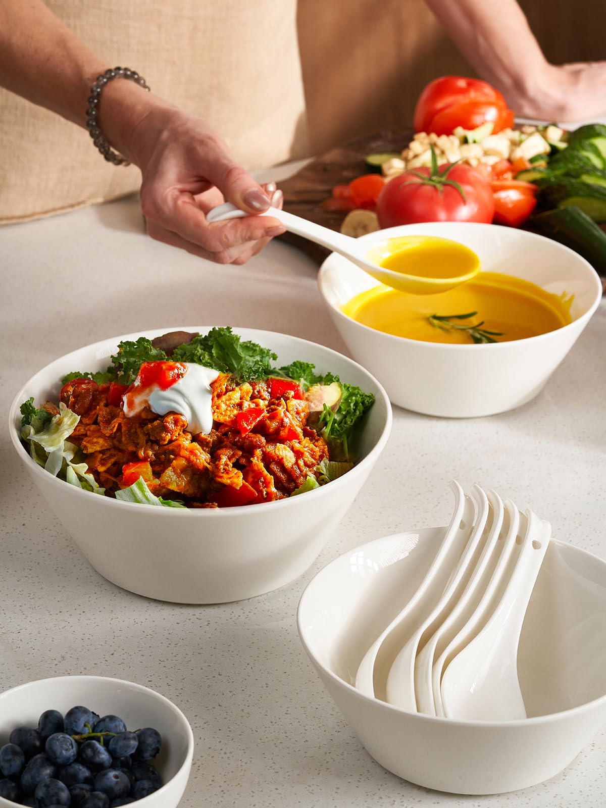 DOWAN stackable white bowls 4pc save cabinet space.