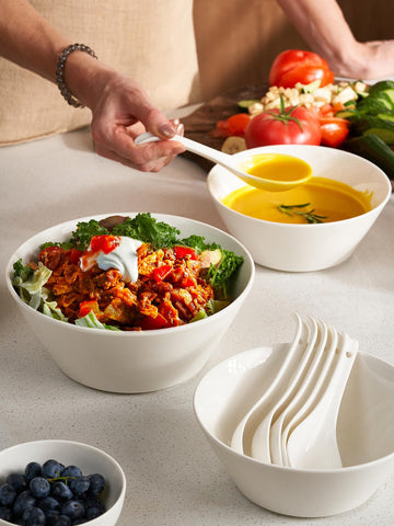 DOWAN stackable white bowls 4pc save cabinet space.
