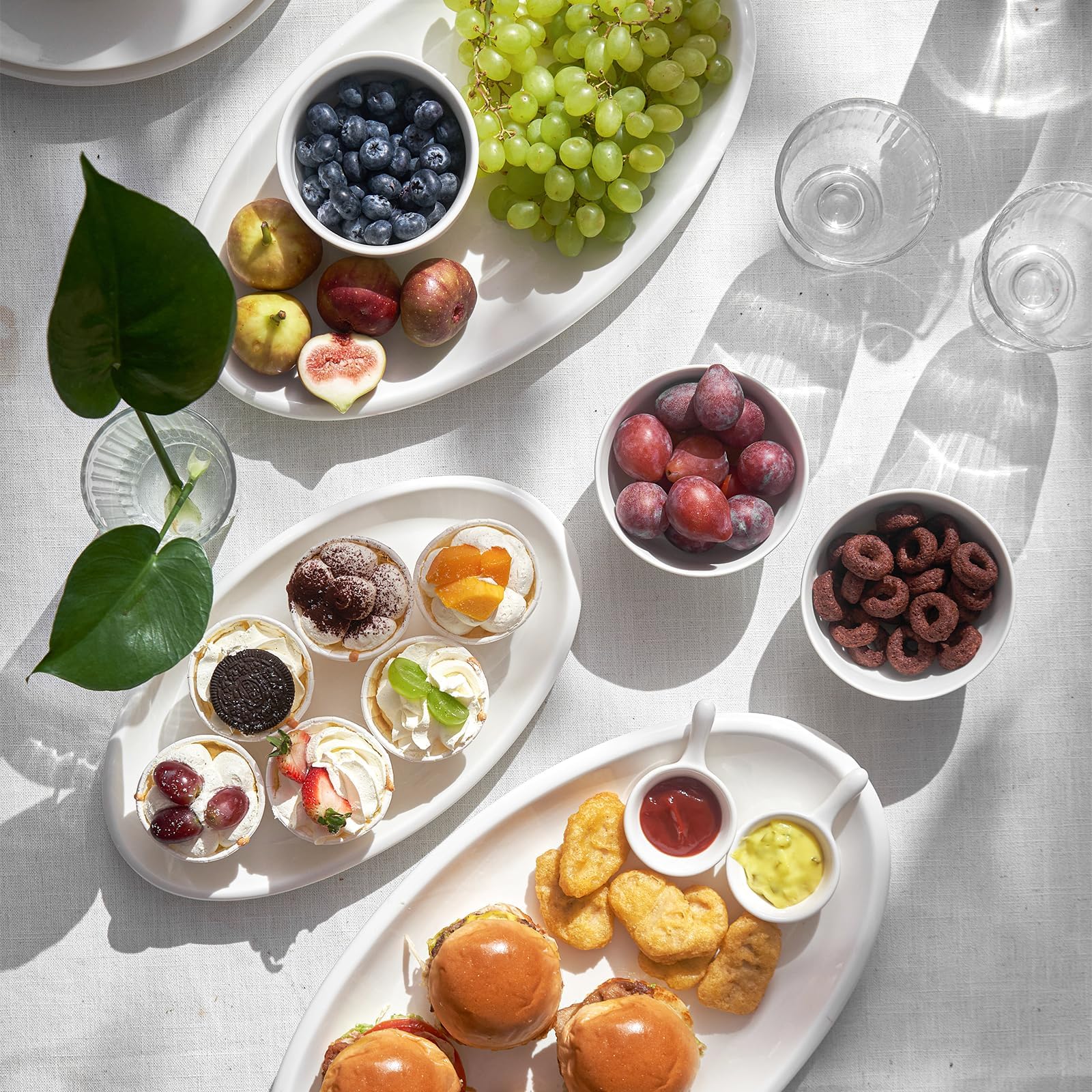 DOWAN stackable white porcelain platter saves cabinet space.