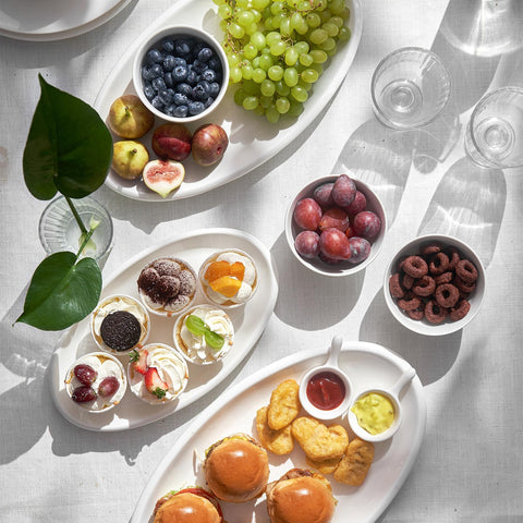 DOWAN stackable white porcelain platter saves cabinet space.