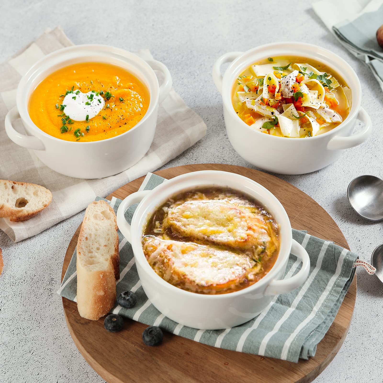 Creamy white DOWAN bowls on a stylish table setting.