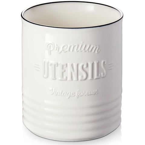 DOWAN white utensil holder on counter keeps spoons and spatulas organized and within reach.