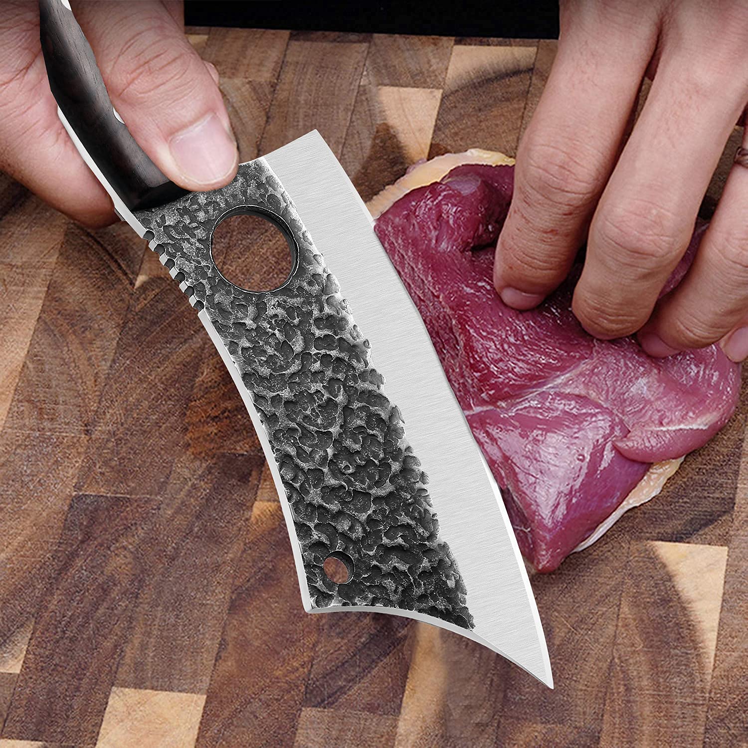 Dragon Riot carbon steel blade is thick and sturdy.