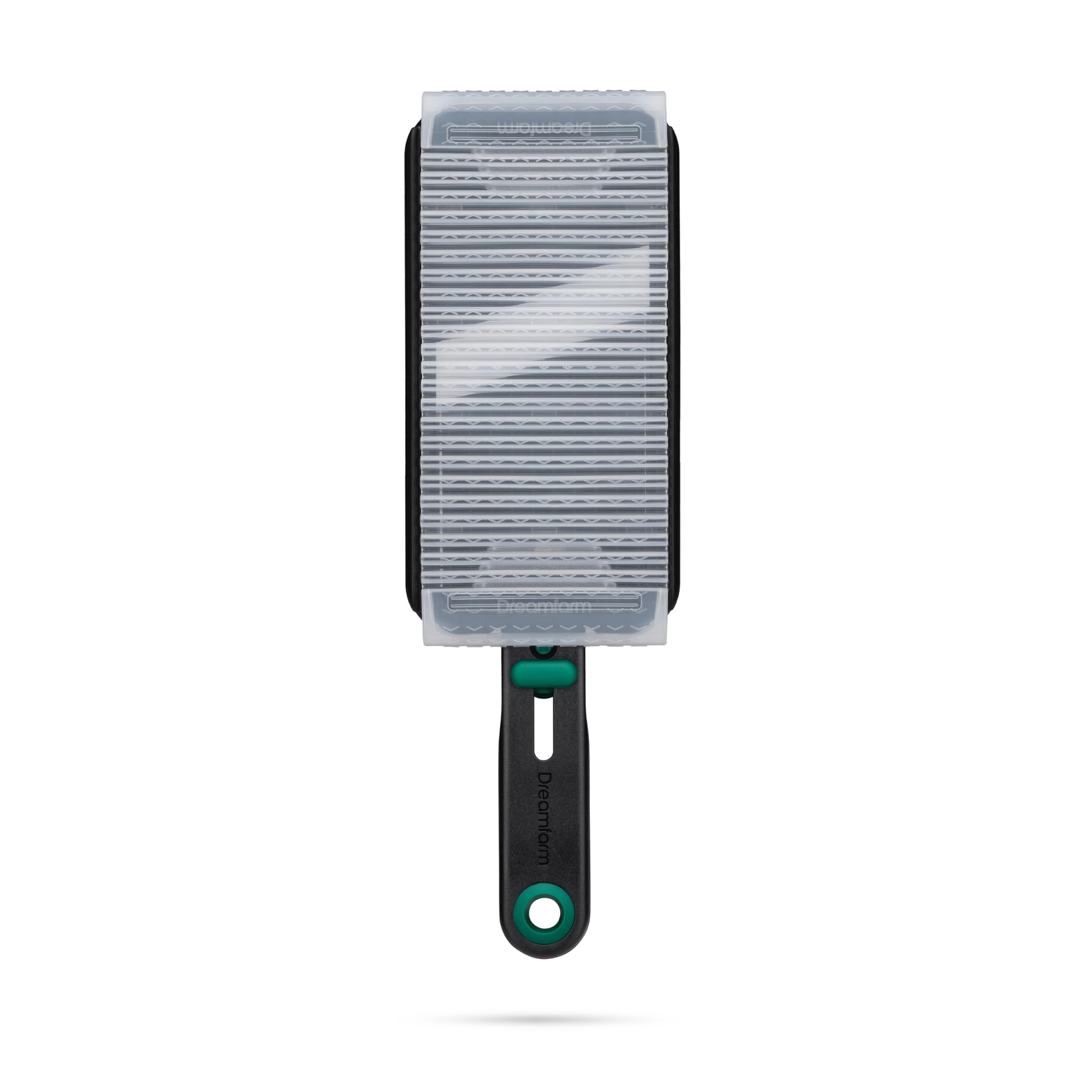 Dreamfarm Nocutu finger guard demonstrates safe slicing with guided tracks for steady cuts.