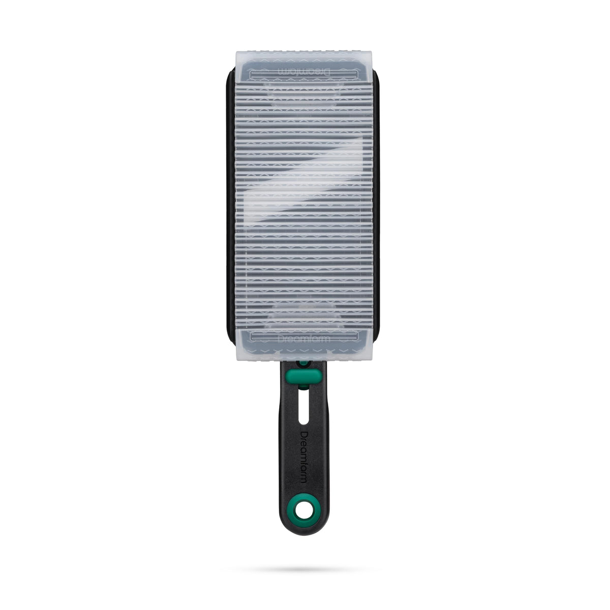 Dreamfarm Nocutu finger guard demonstrates safe slicing with guided tracks for steady cuts.
