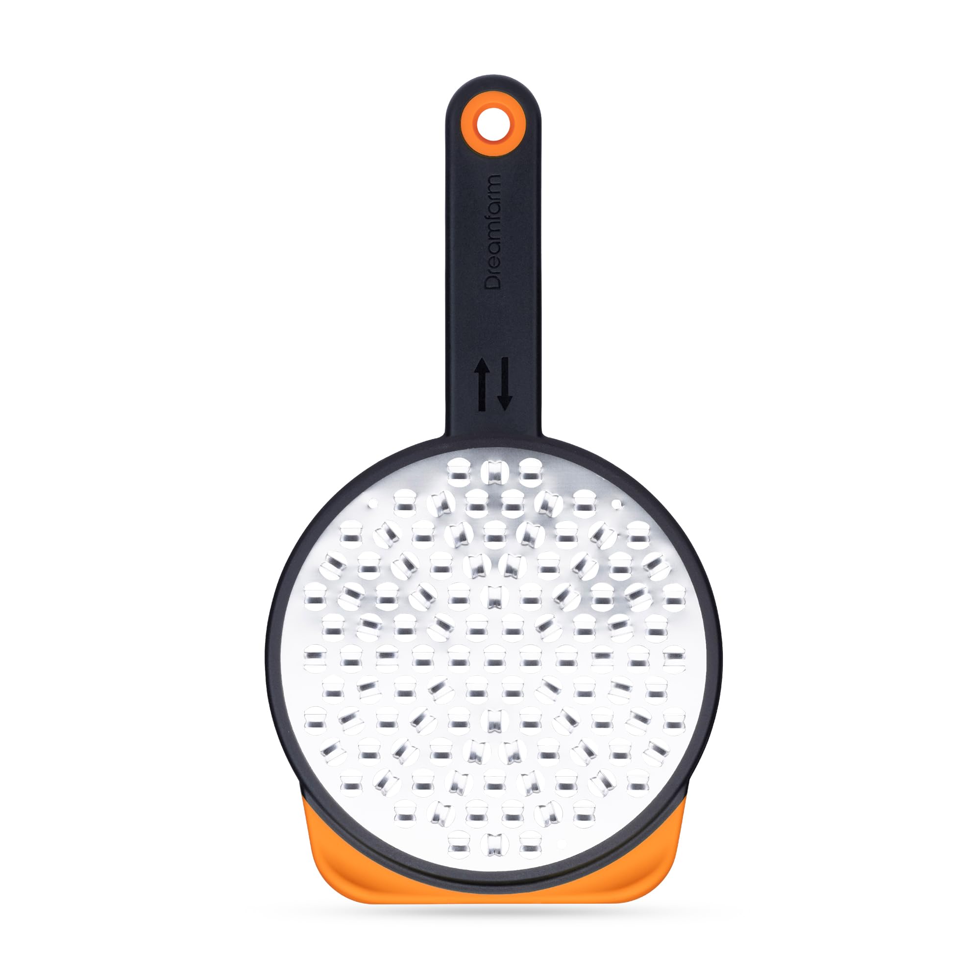 Dreamfarm Ograte bottom blades in circular motion for fast, even grating.