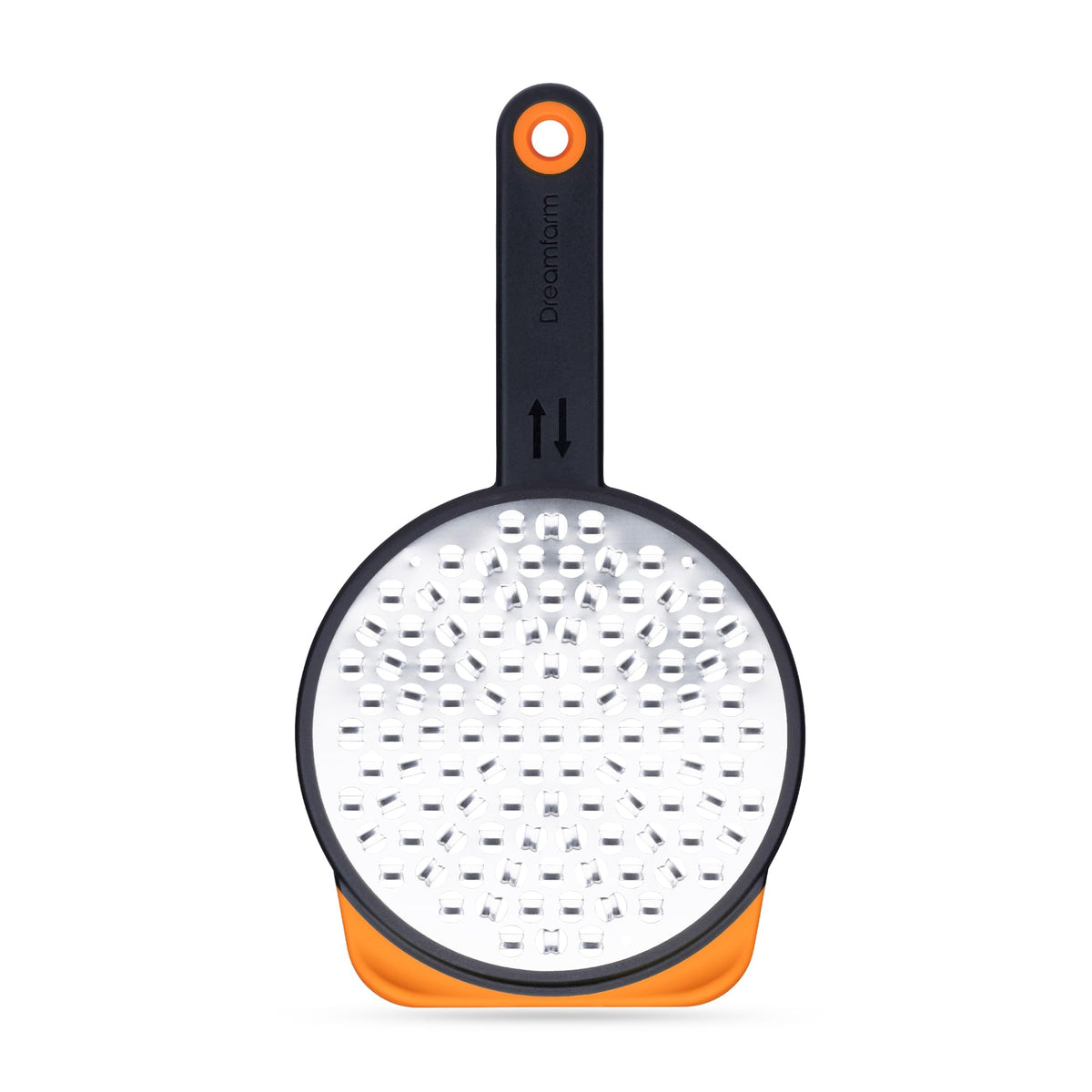 Dreamfarm Ograte bottom blades in circular motion for fast, even grating.