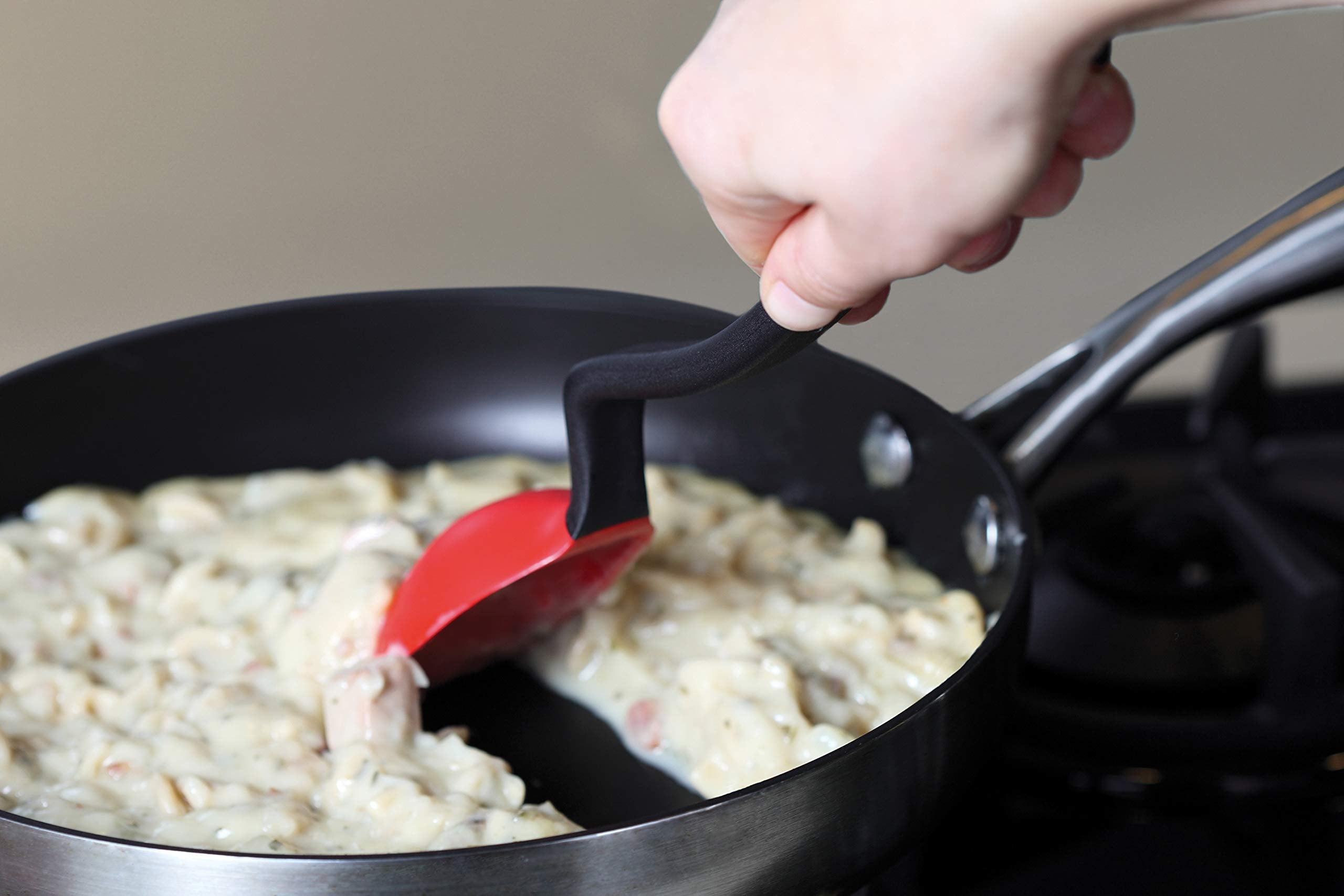 Dreamfarm Supoon flat silicone scraping tip for easy food squeegee action.