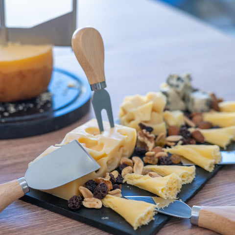 Drovier cheese curler tray grip pins secure soft cheeses.