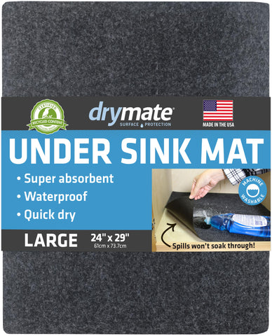 Drymate under-sink mat with absorbent top design keeps cabinets dry