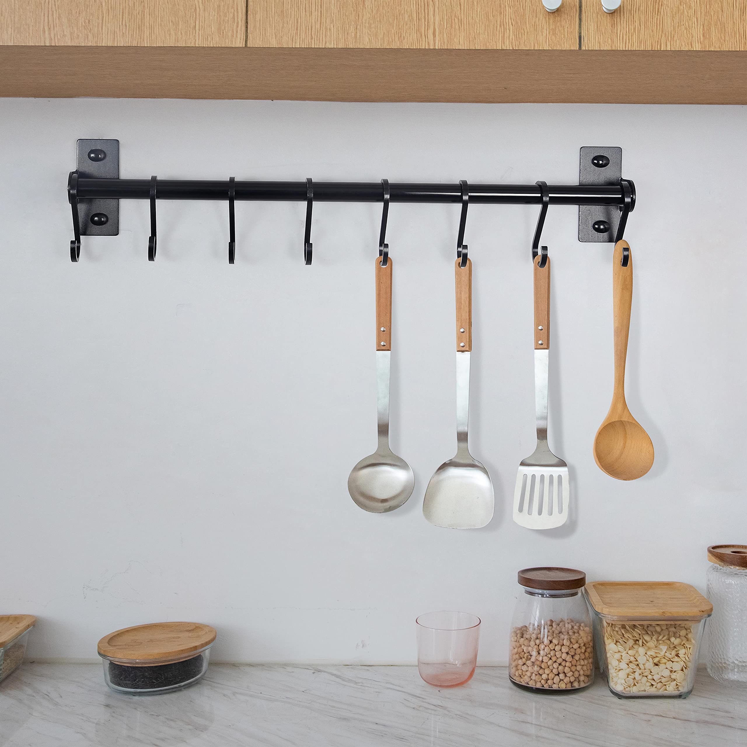 Dseap utility rail doubles as broom or accessory organizer.