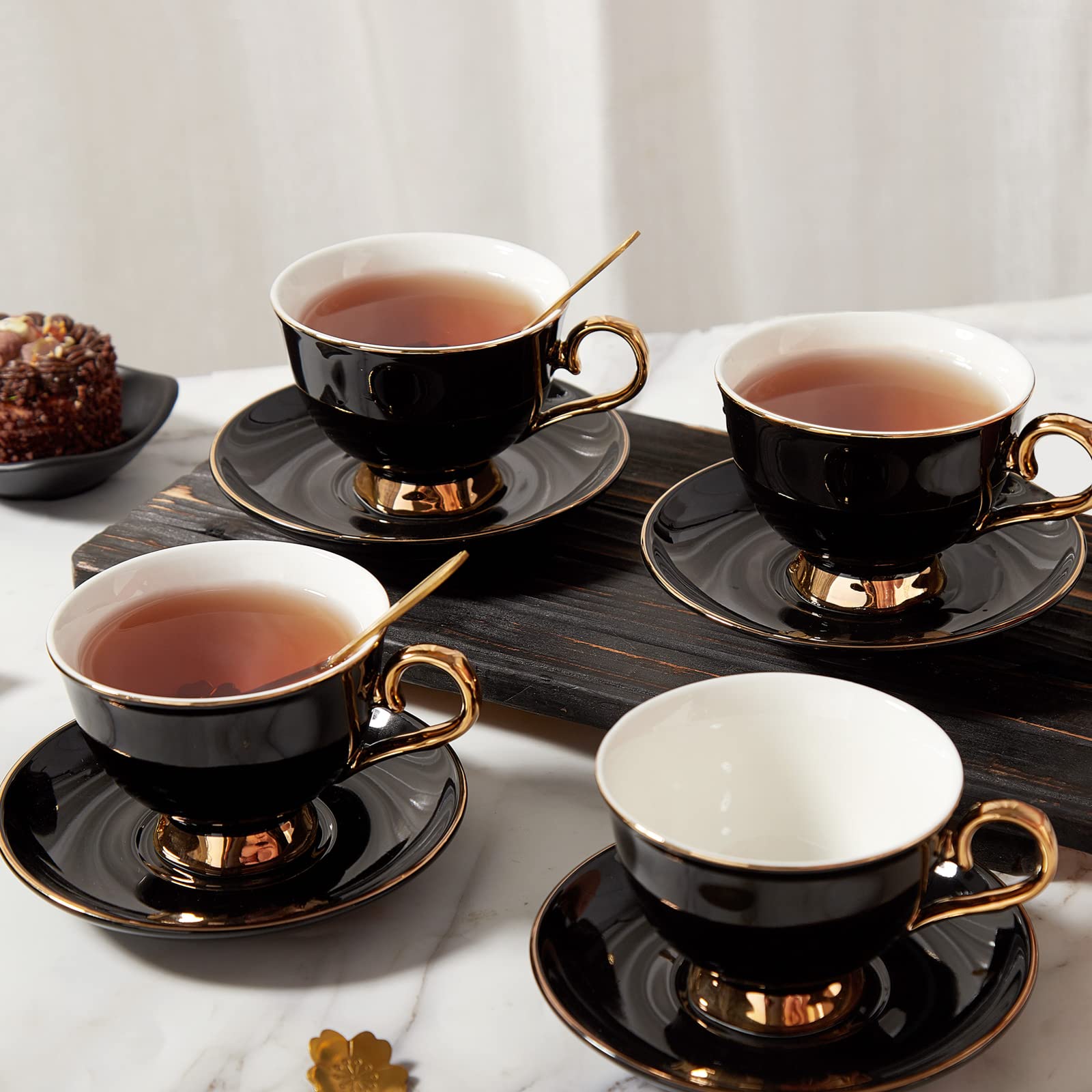 DUJUST teacup with golden trim handle showing luxurious comfort.