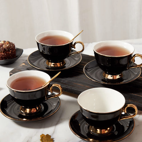 DUJUST teacup with golden trim handle showing luxurious comfort.