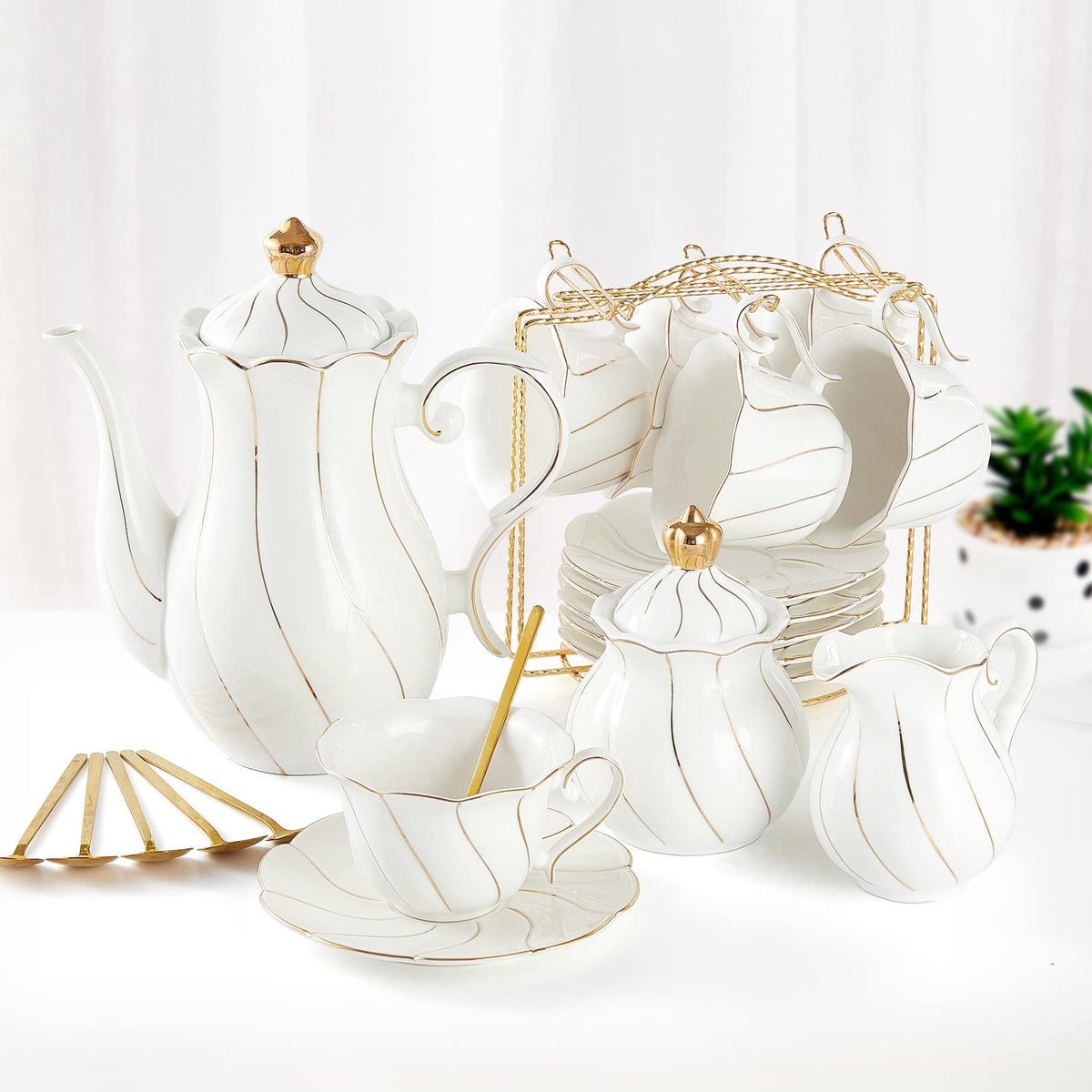 DUJUST white porcelain tea set on a stand, elegant presentation for guests.