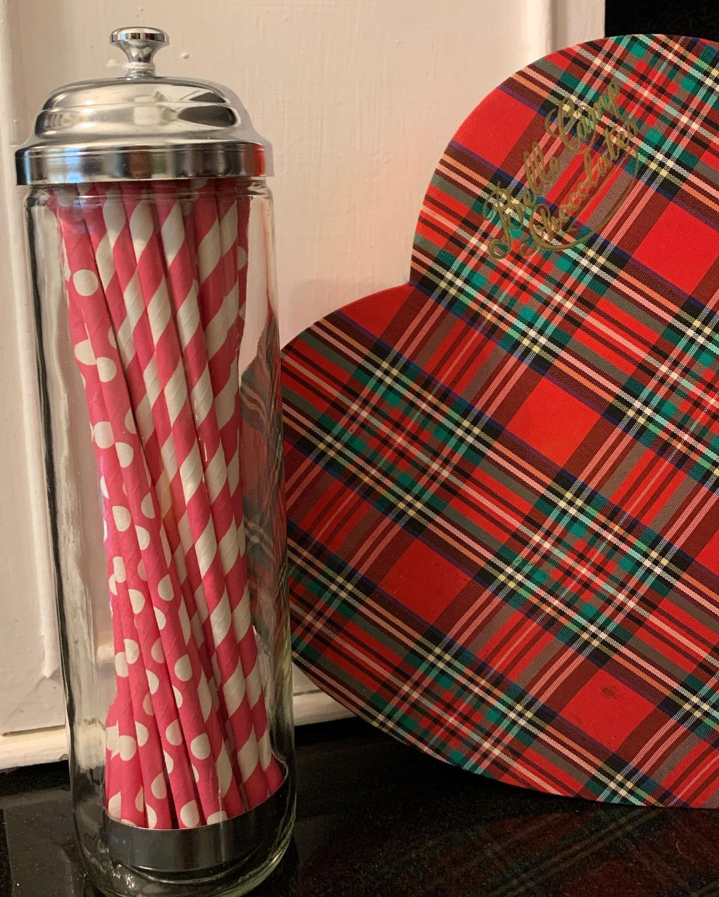 Dukars dispenser accommodates wrapped and unwrapped straws for flexible use.