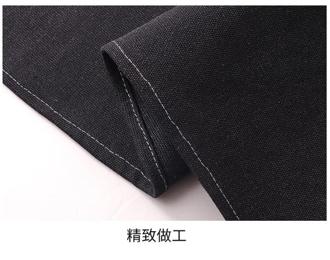 Duogoo black unisex chef apron provides full-coverage protection.