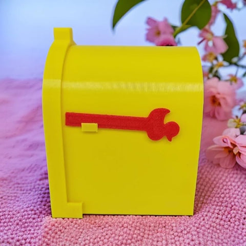 Durable yellow Cruising Duck Mailbox decor on metal surfaces adds bright character.