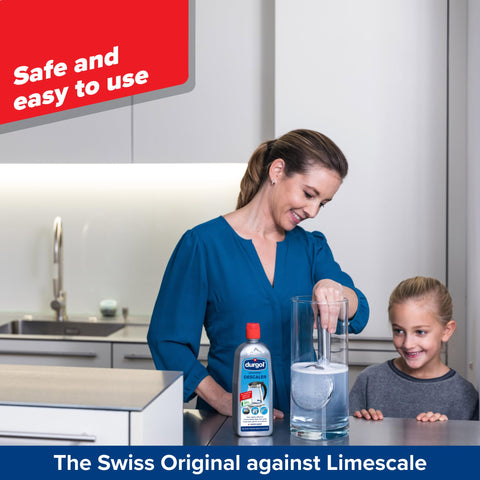 Kitchen sink and tap after applying Durgol Universal.