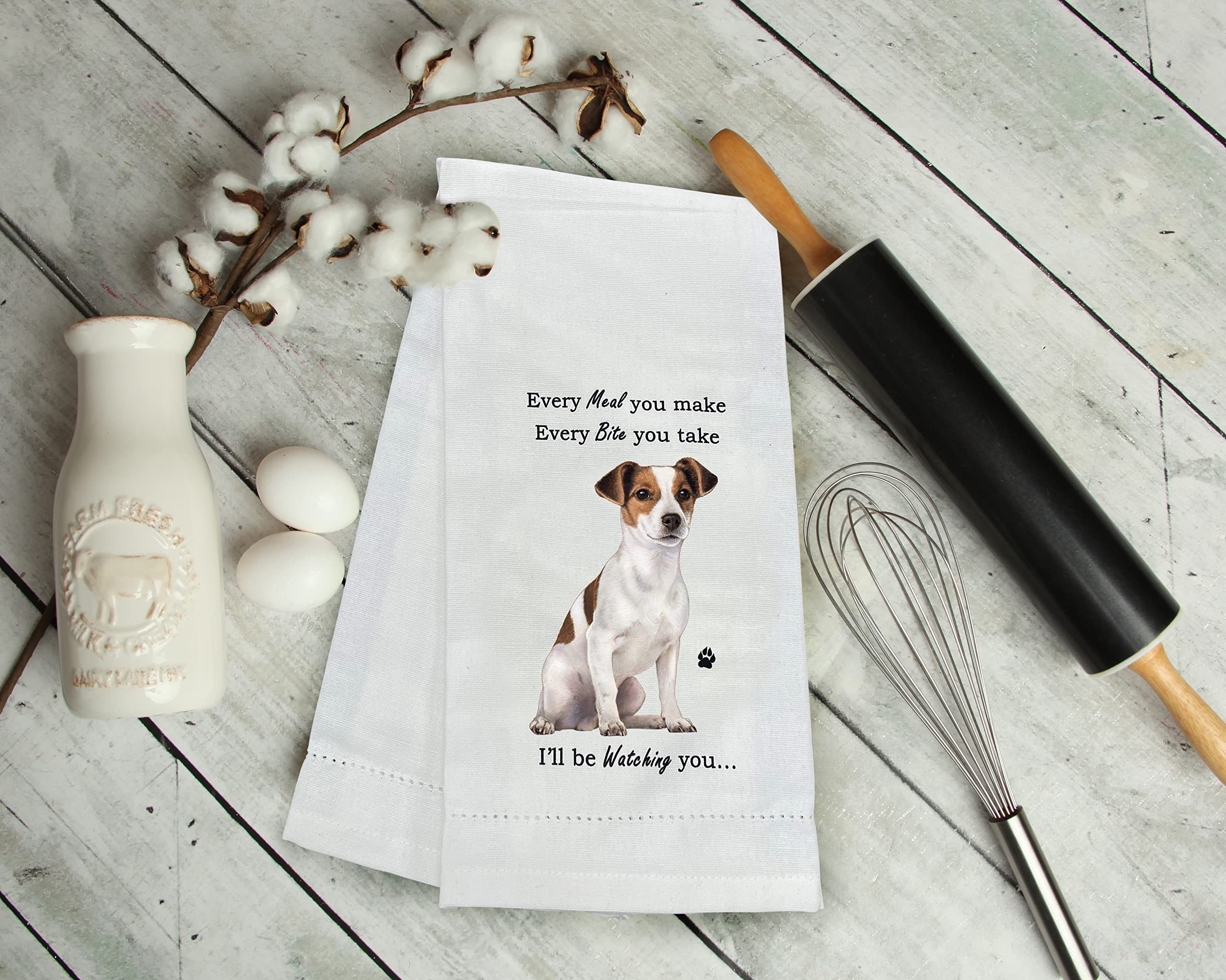 E&S Pets Jack Russell towel absorbency demo highlights quick liquid pickup for busy kitchens.