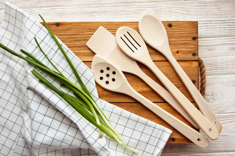 ECOSALL beechwood slotted spatula aids draining and turning foods.