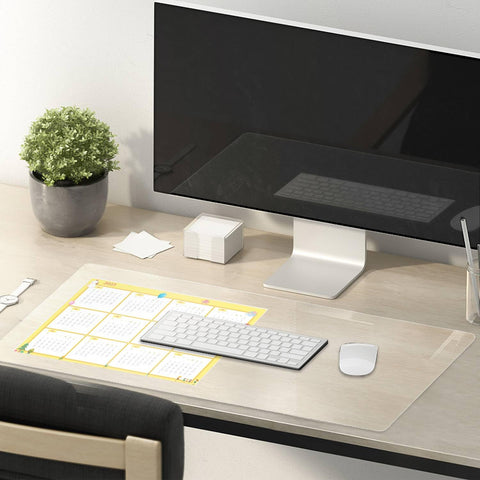 Eisdroma clear table cover on dining table provides waterproof shield against spills.