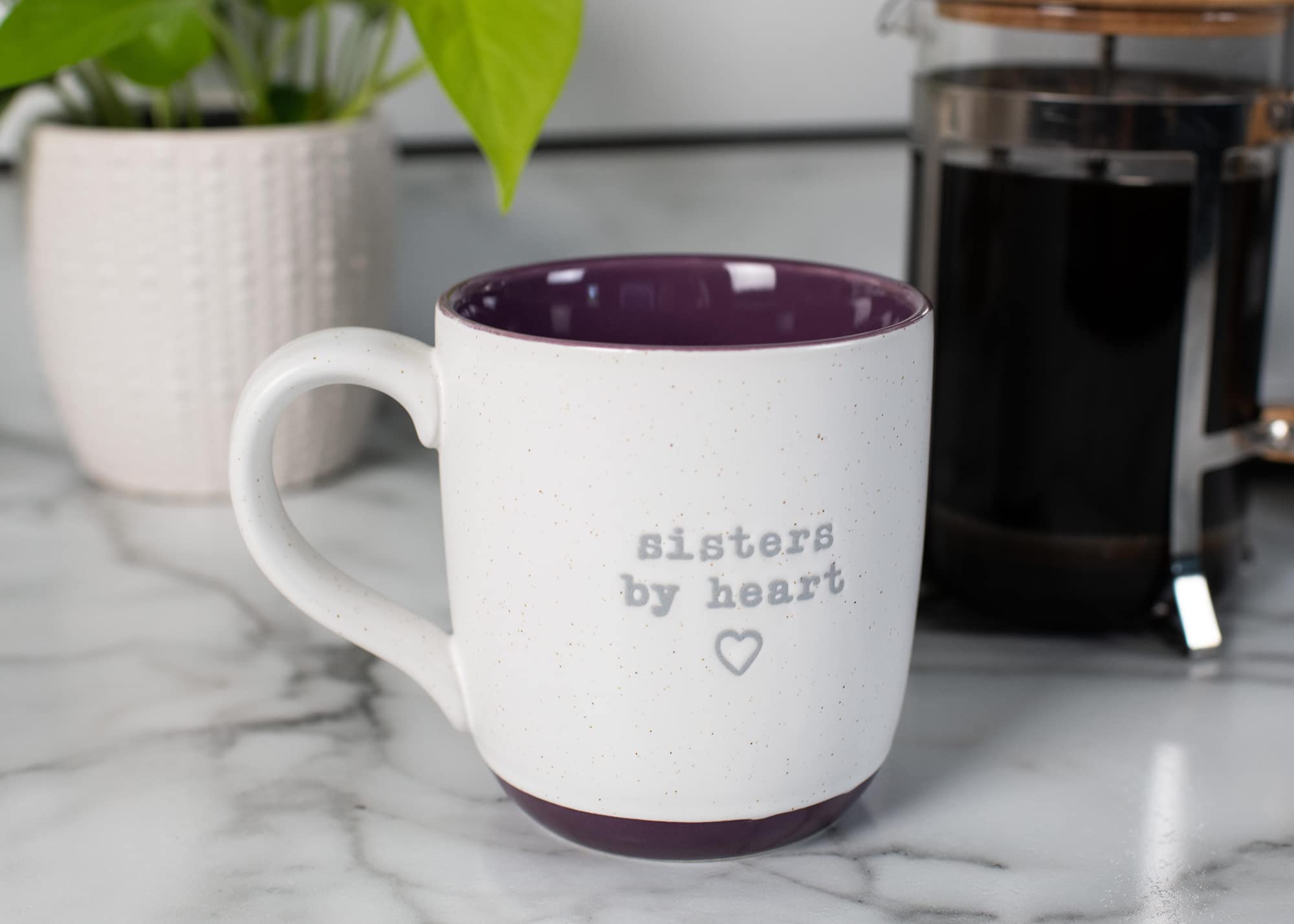 Elanze Designs Sisters By Heart mug in use with coffee for daily moments.