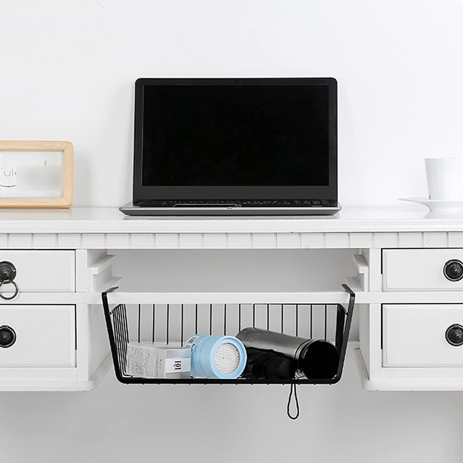 ELEATTRUN undershelf basket helps organize kitchen wraps and utensils.