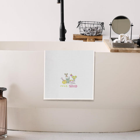 Elefeltclave decorative hand towel adds color to the kitchen or bar area.