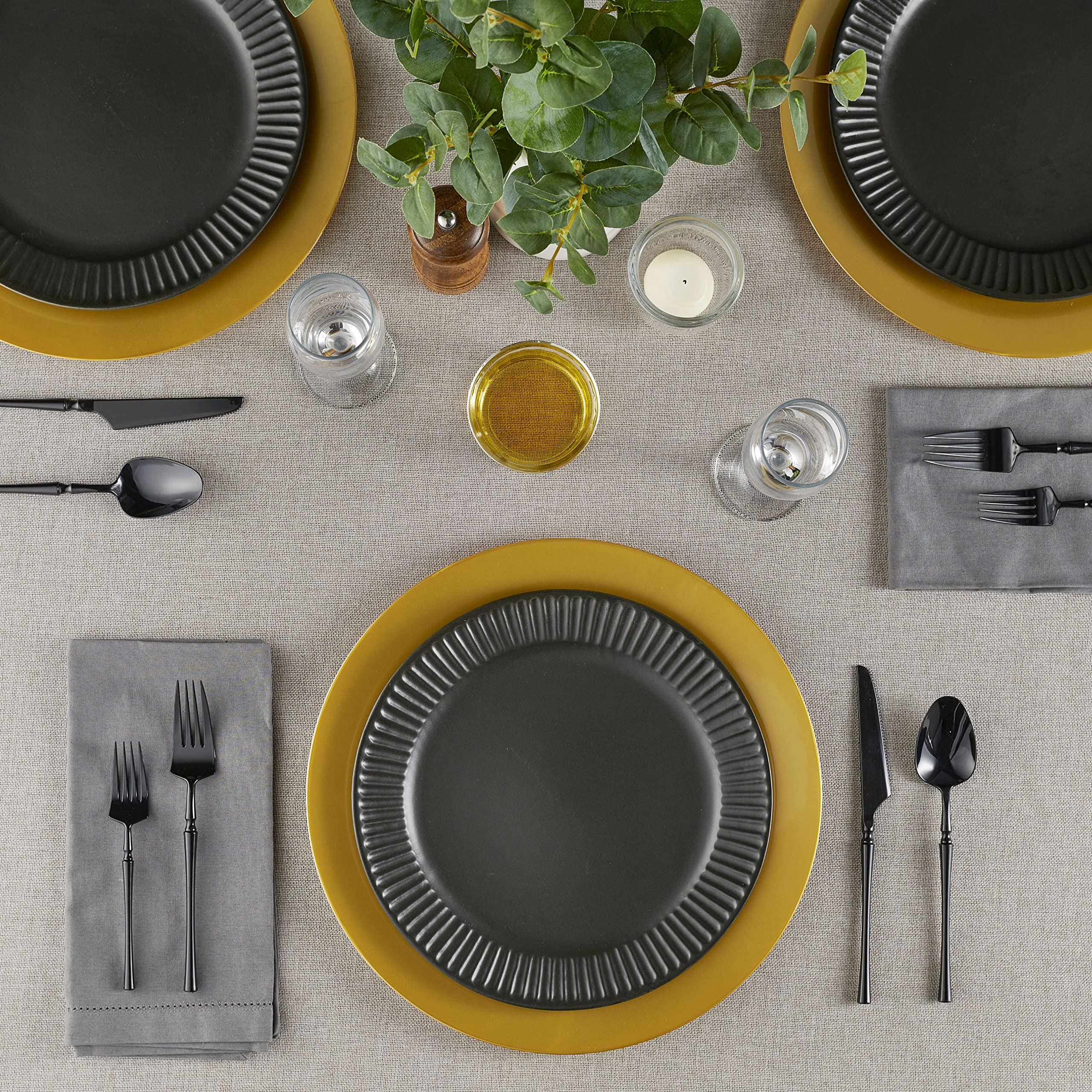 ELEGANT DISPOSABLES chargers on table setup for a wedding reception.