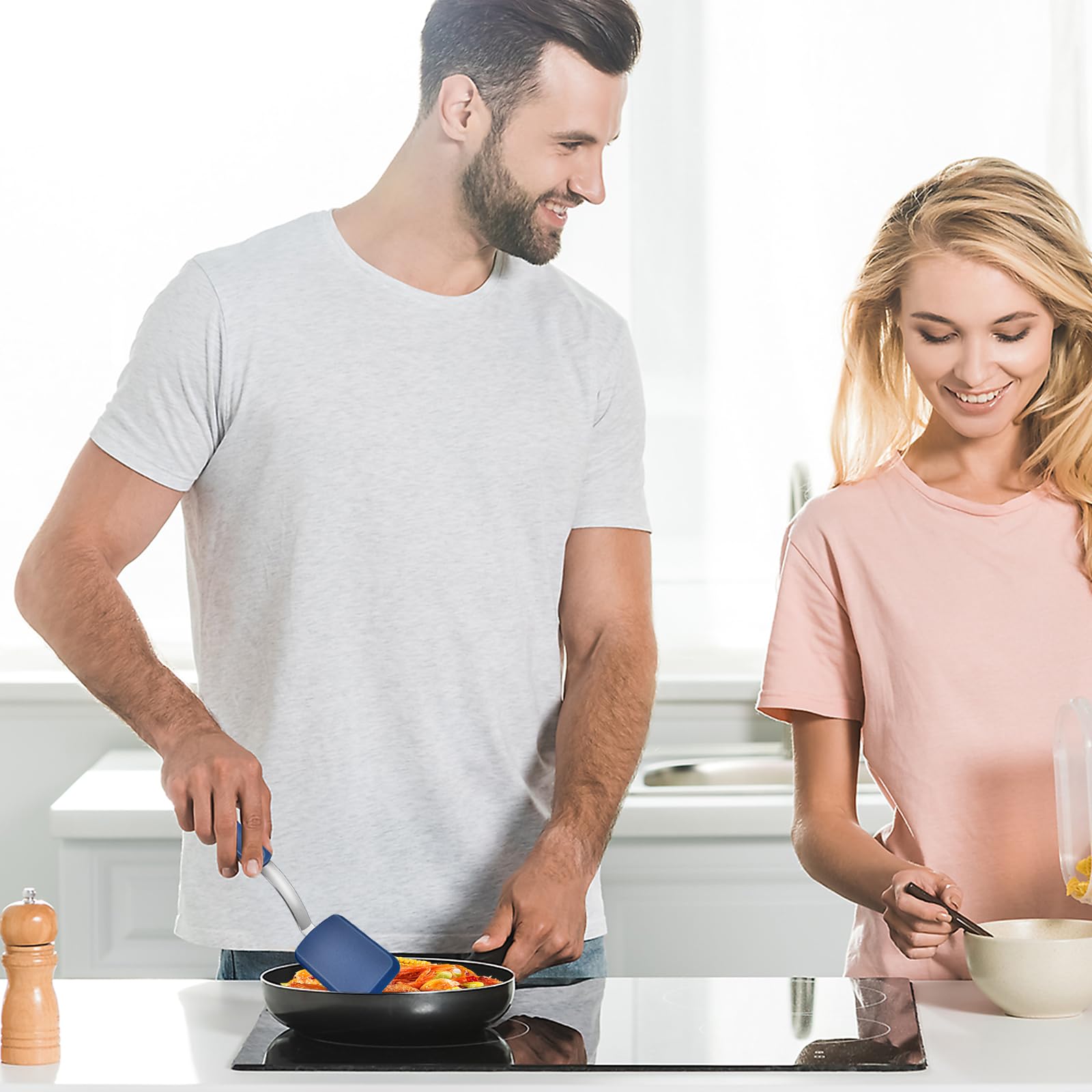 Elesunory multiuse spatula for flipping steaks, cookies, and cakes.