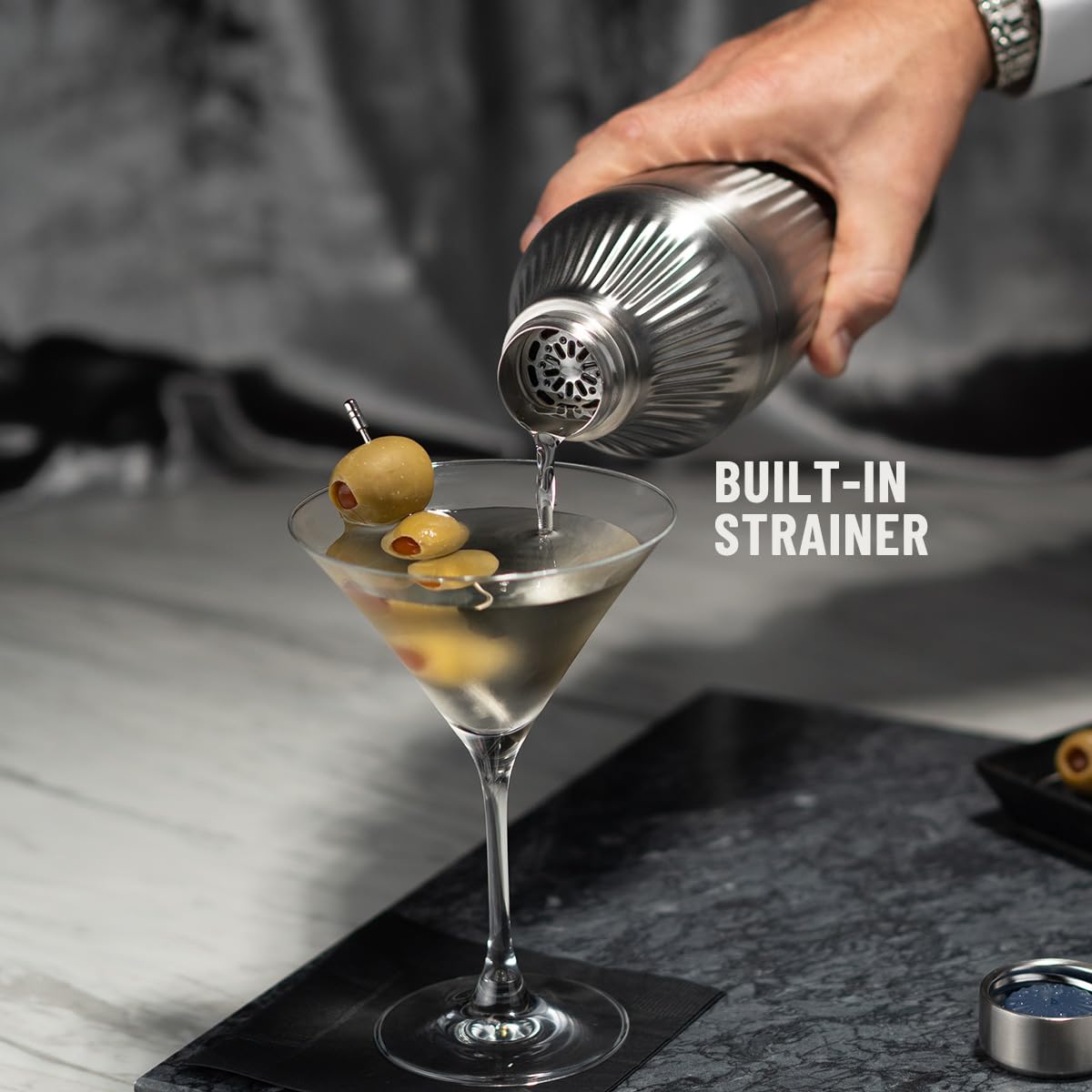 Elevated Craft Diamond Edition shaker shows smooth pour from integrated strainer