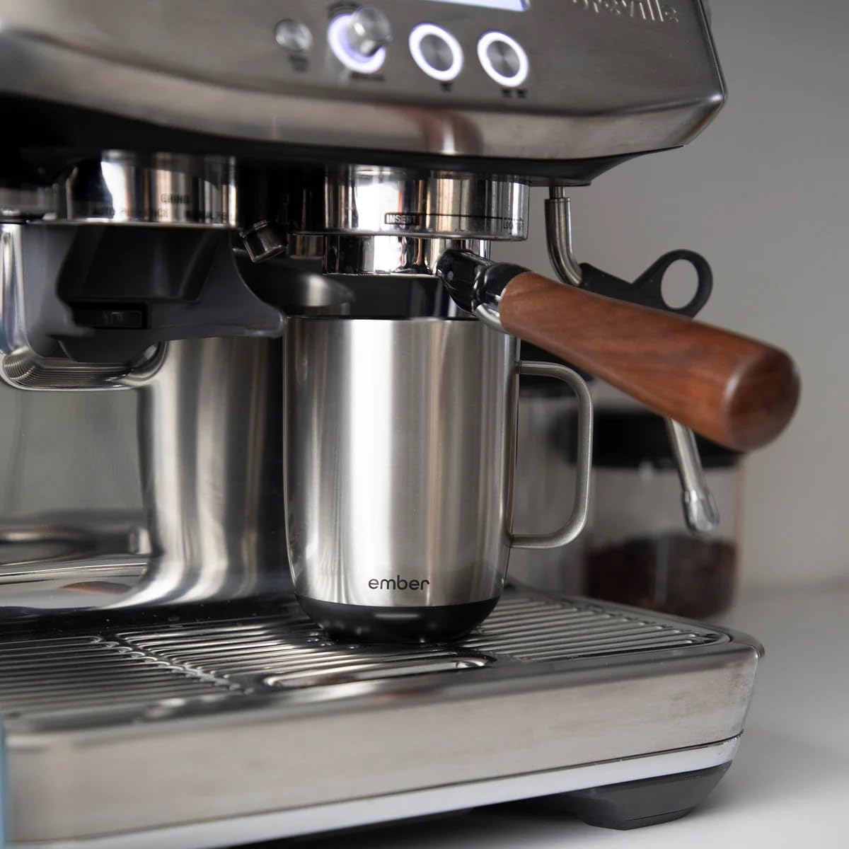 Ember Mug 2 charging coaster keeps beverage warm all day.
